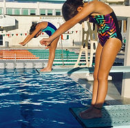 Two divers on the springboard